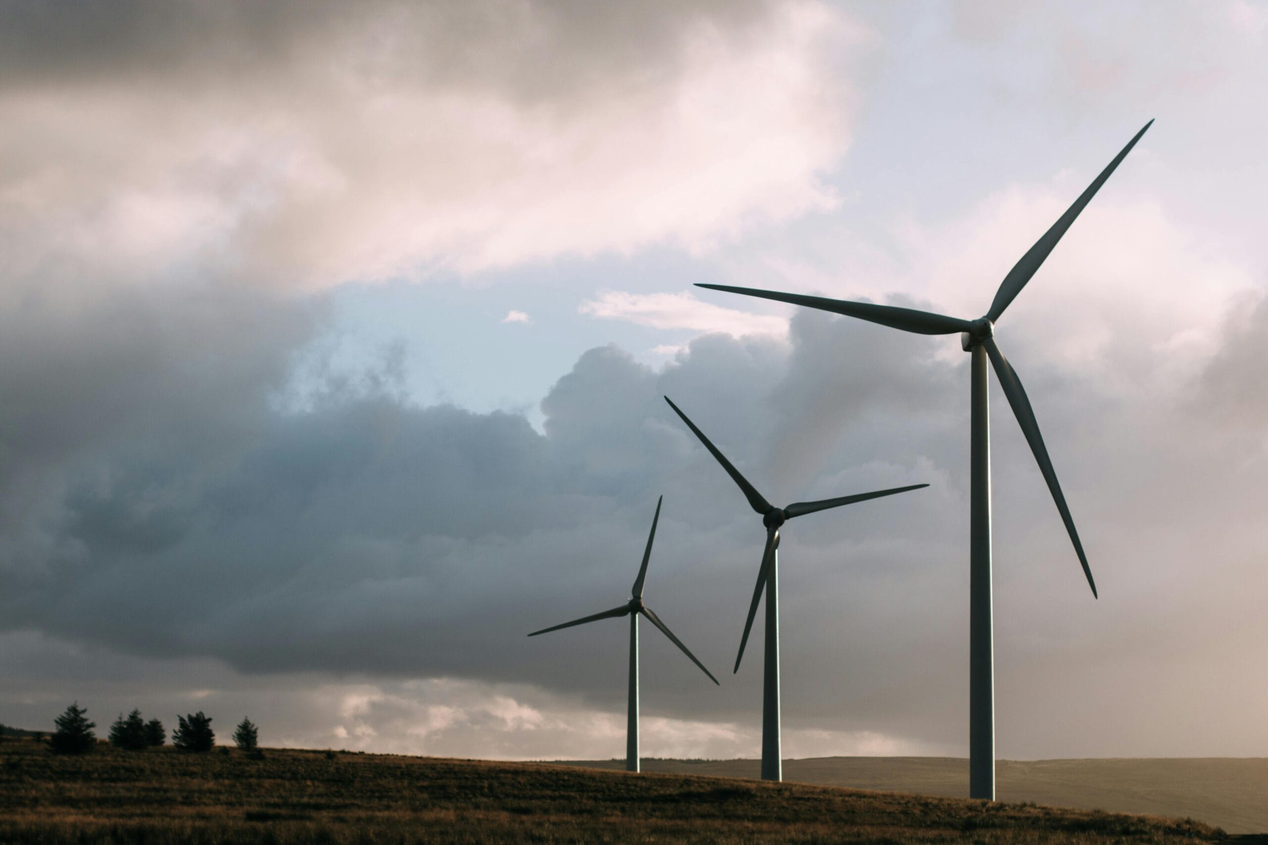 Wind turbines at a wind farm illustrating alternative energy sector expertise in industrial property tax consulting.