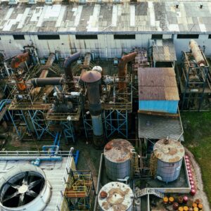 Aerial view of a refinery for comprehensive real property tax analysis in industrial valuation.